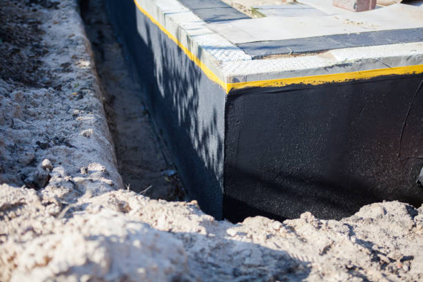 Professional Waterproofing technician working in Schoolcraft, MI